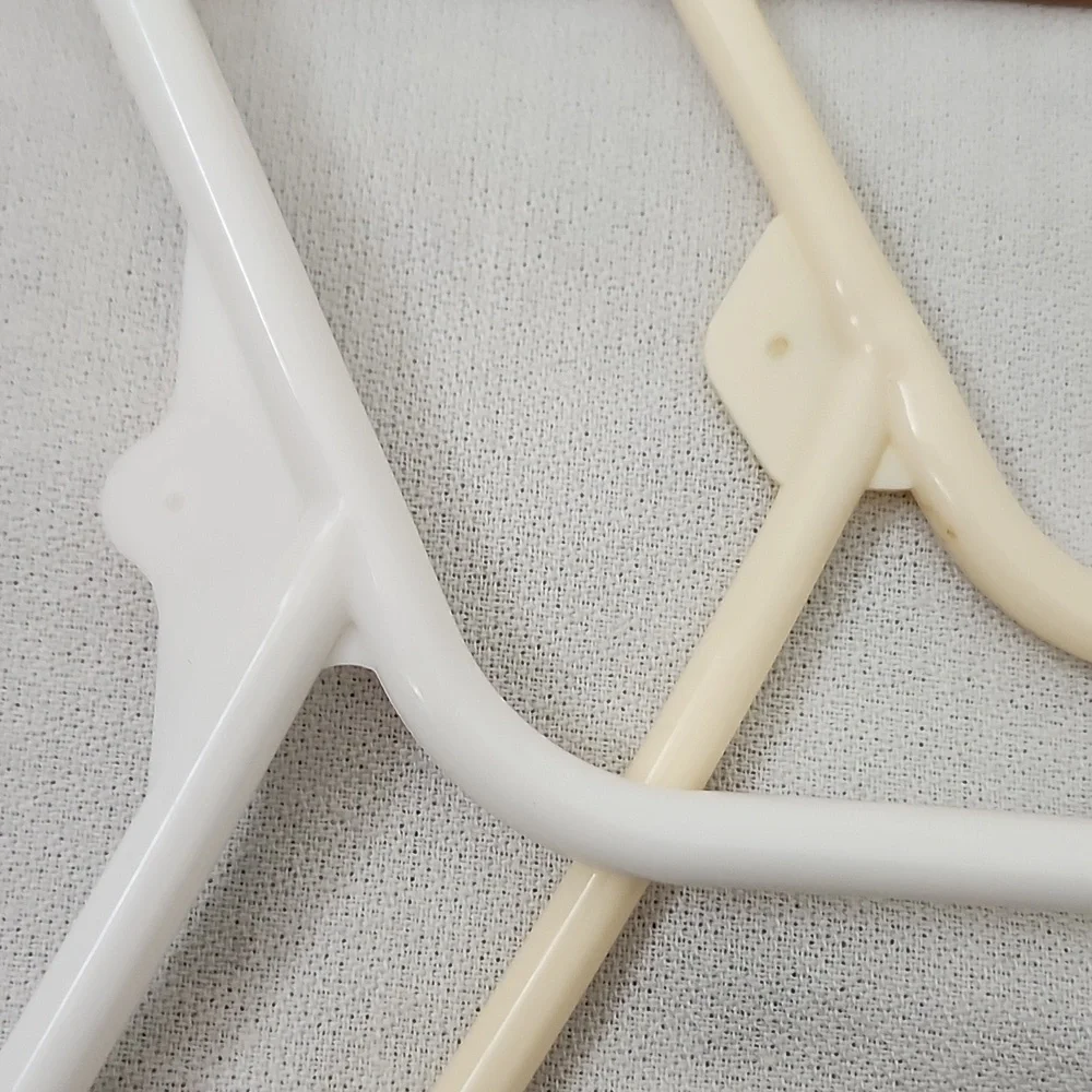 Set of 40 White and Cream Plastic Hangers